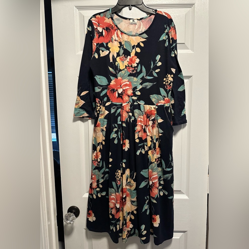 JessaKae midi length floral print dress. Size L